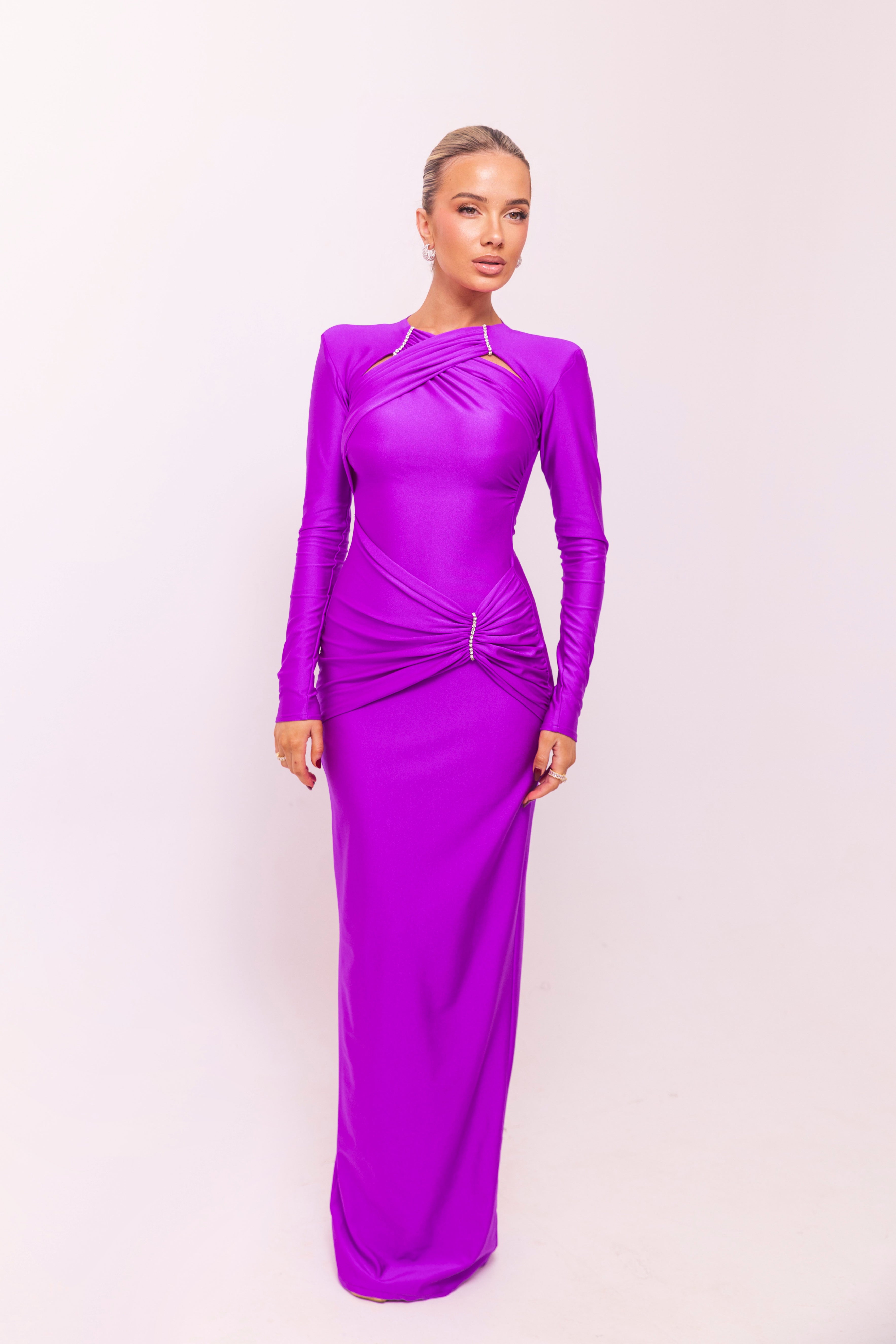 Lavender gown with long sleeves and delicate draped detailing for an elegant look.